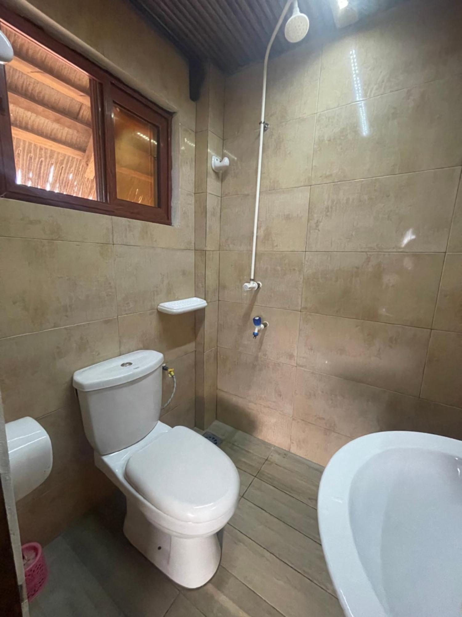 Tata Beach Hotel Cotonou Bagian luar foto